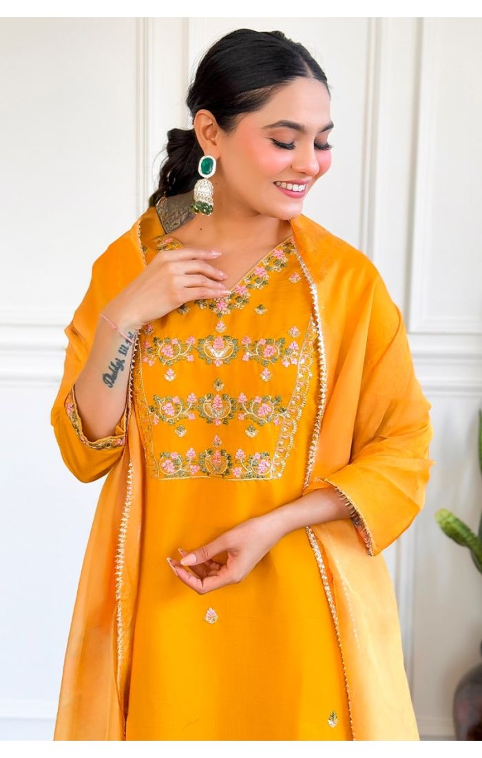 Elegant yellow embroidered kurti set for weddings and festive occasions with a dupatta