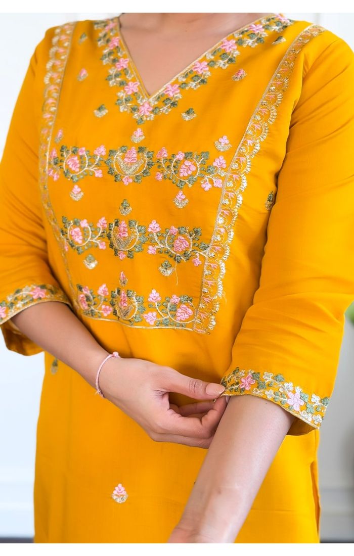 Elegant yellow embroidered kurti set for weddings and festive occasions with a dupatta