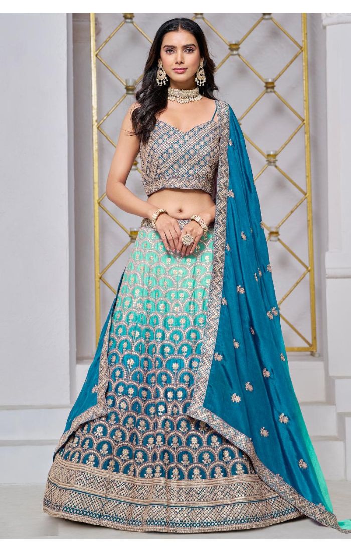 Teal Blue Velvet Zari Embroidered Lehenga Choli with Contrasting Net Dupatta