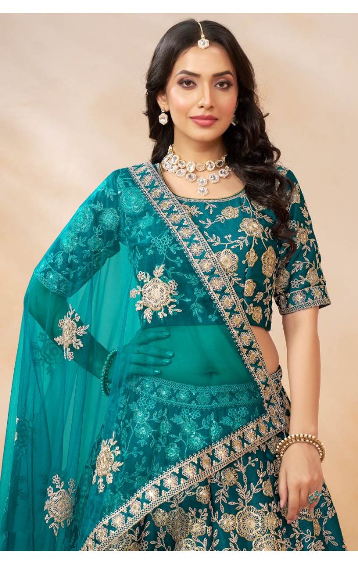 Teal Embroidered Lehenga Choli Set with intricate floral embroidery, matching blouse, and lightweight dupatta for weddings and festive occasions worldwide.