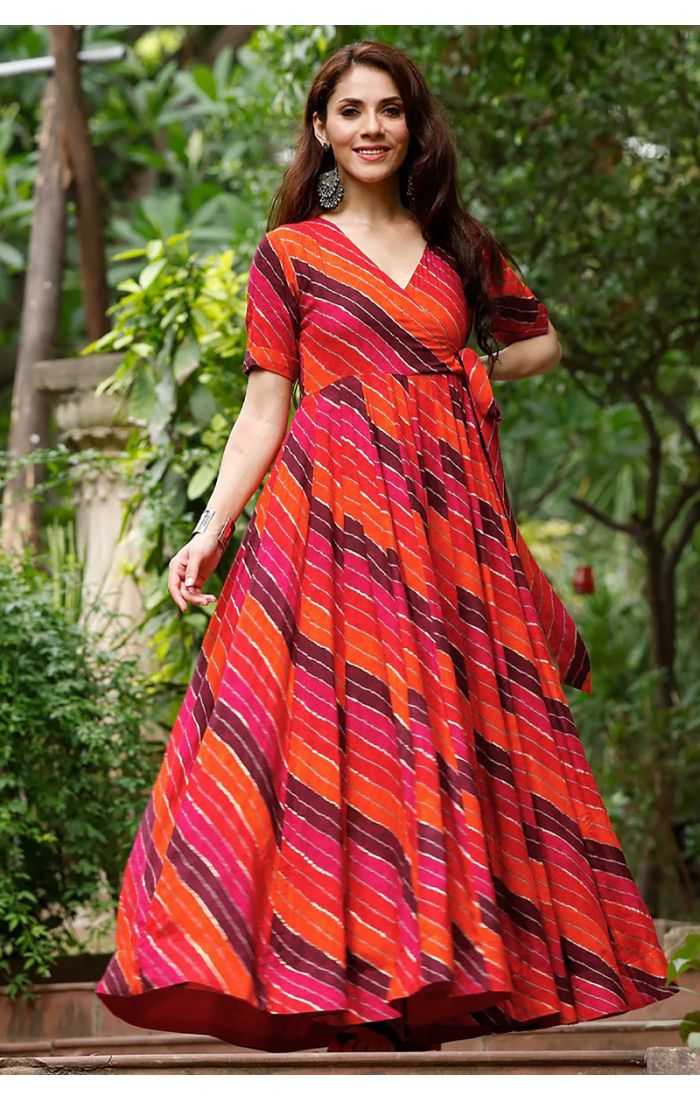 Vibrant Sunset Bandhani Anarkali Gown with flowing silhouette and warm sunset tones.