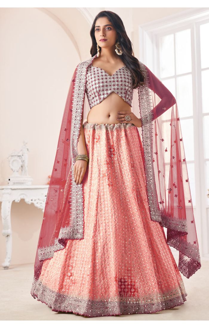 Designer Lehenga Choli with embroidery and dupatta for festive occasions.