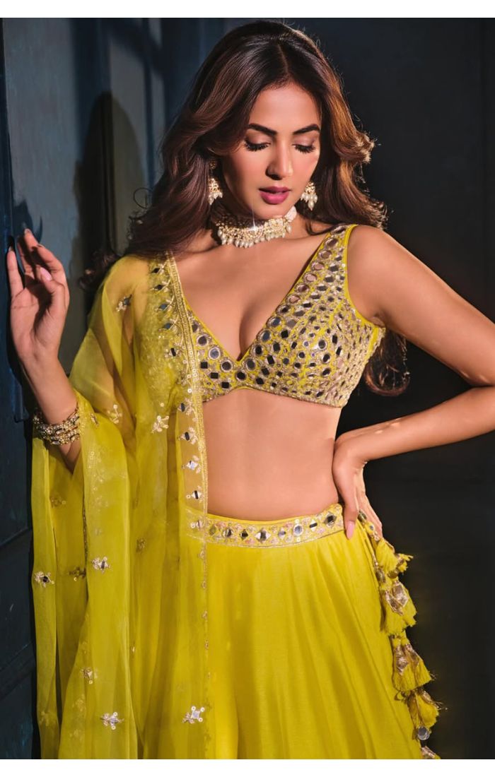 Yellow georgette mirror work party wear lehenga choli with deep V neckline, mirror embroidered blouse and dupatta – Appelle Fashion 