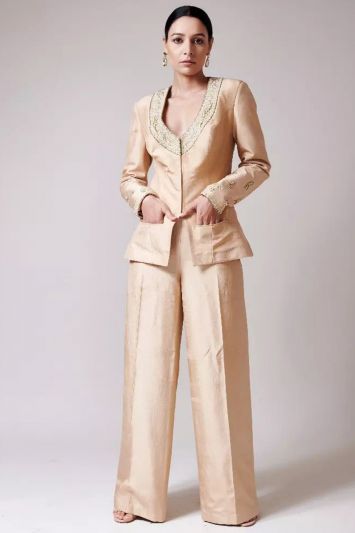 This Designer Beige Color Trouser Suit