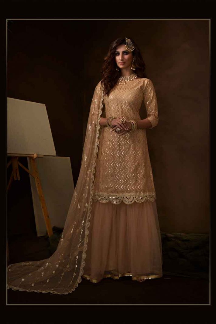 Light Peach Net Heavy Designer Sharara Suit With Jari Embroidery And Sequence Work